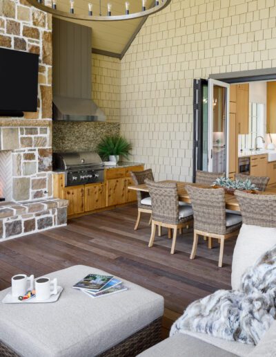 A living room with a fireplace and tv.